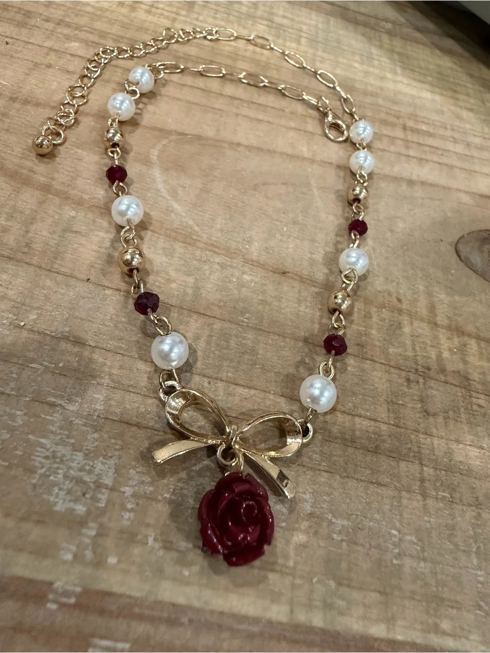 Francesca's Collections Gold Bow Necklace with Burgundy Rose and Pearls